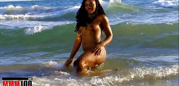  Hot black Nancy Love stripping by the sea